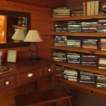 Waipio Wayside, Library Room, shelves of books by night stand